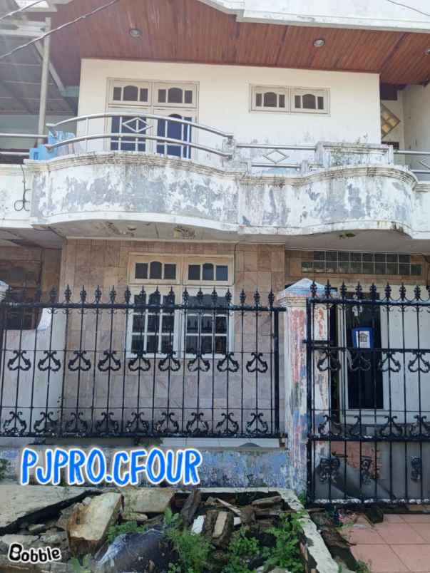 dijual rumah taman harapan baru