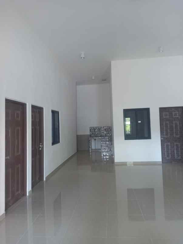 dijual rumah wiguna