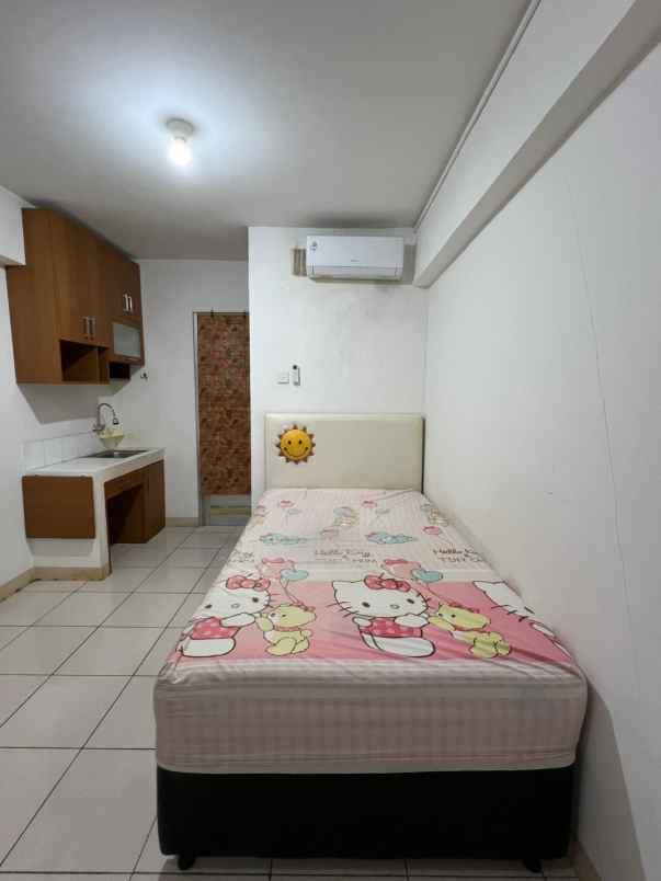 jual apartemen studio semi furnished green bay pluit