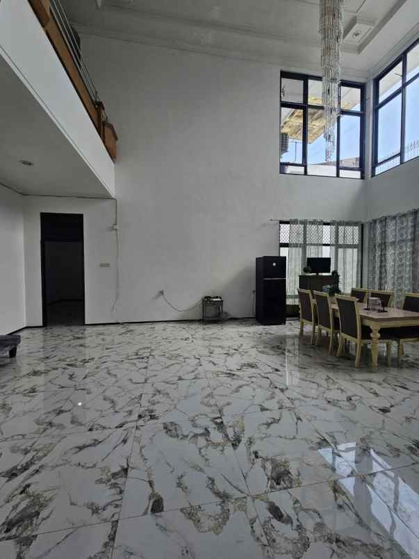 rumah dharmahusada indah strategis siap huni