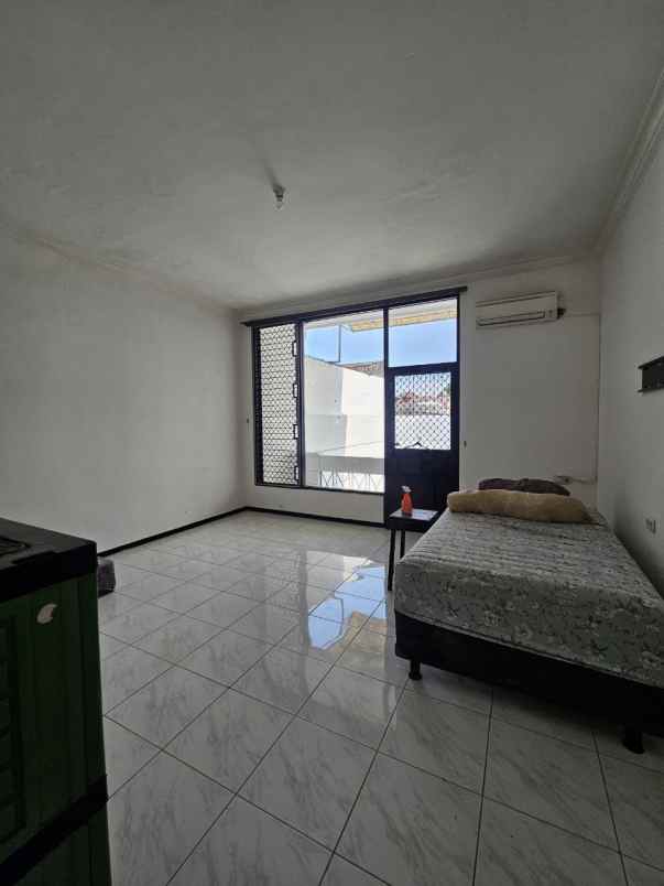 rumah dharmahusada indah strategis siap huni