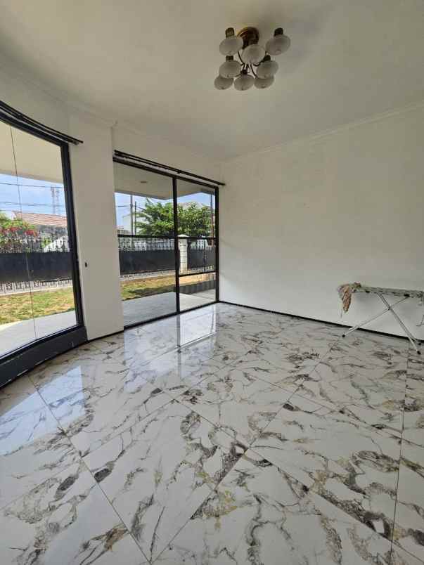 rumah dharmahusada indah strategis siap huni