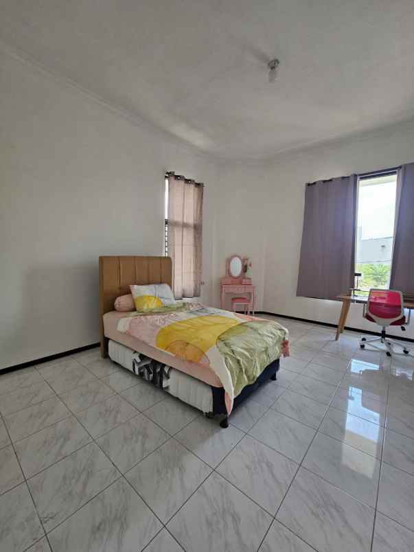 rumah dharmahusada indah strategis siap huni