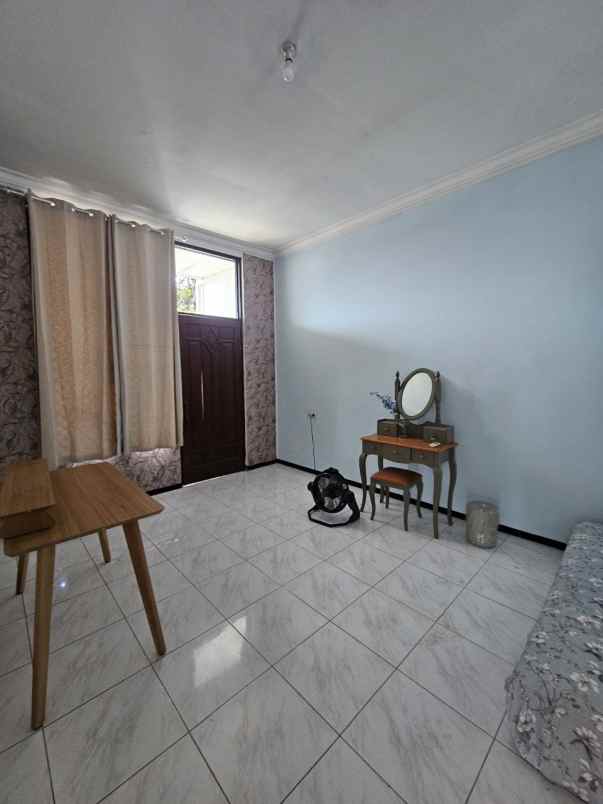 rumah dharmahusada indah strategis siap huni