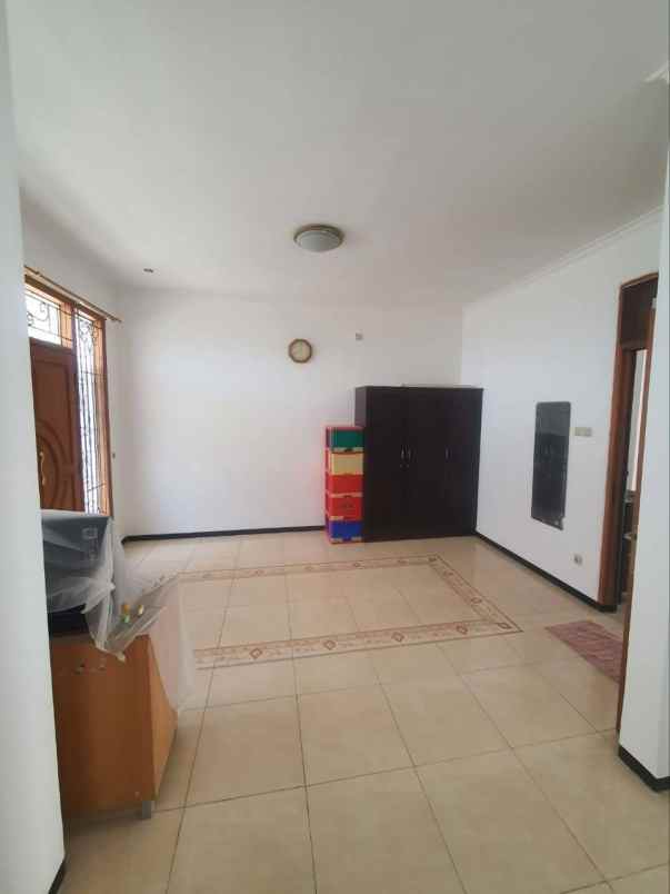 rumah di dharmahusada indah mas