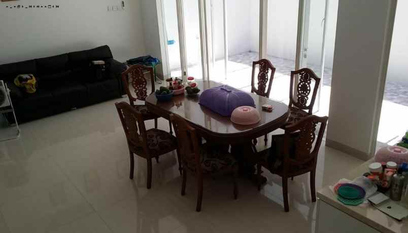 rumah long beach pakuwon city strategis minimalis