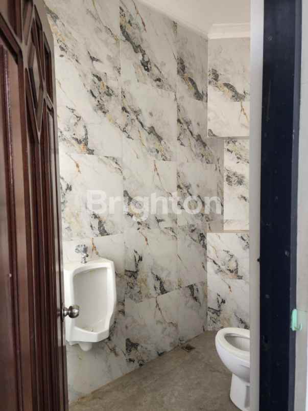 rumah luas hook dharmahusada indah