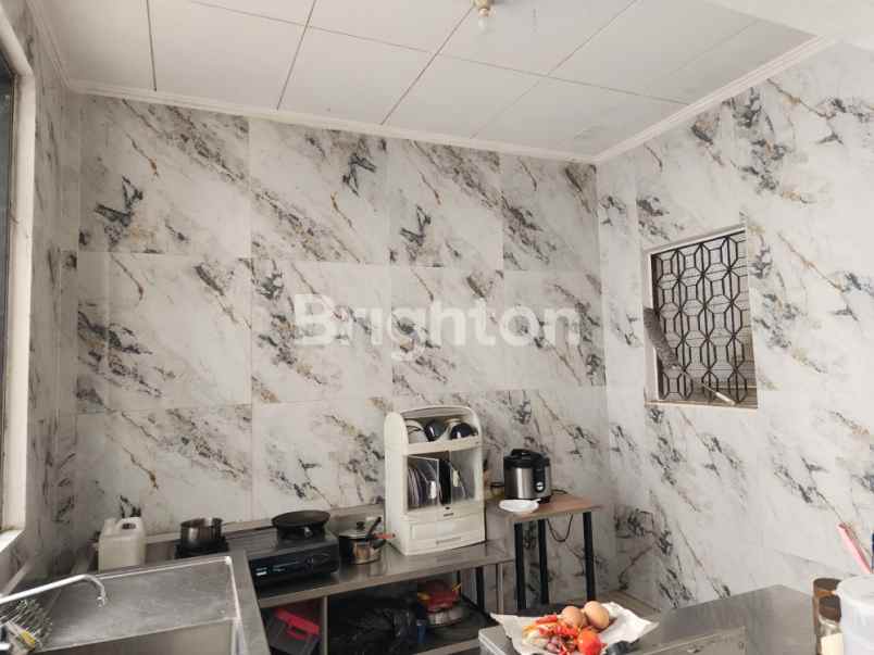 rumah luas hook dharmahusada indah