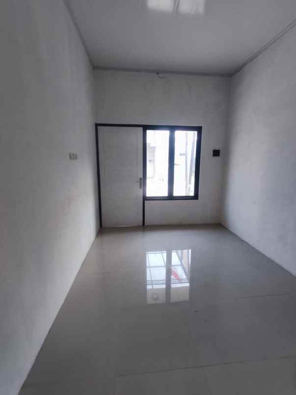 rumah murah baru gres di graha raya fortune