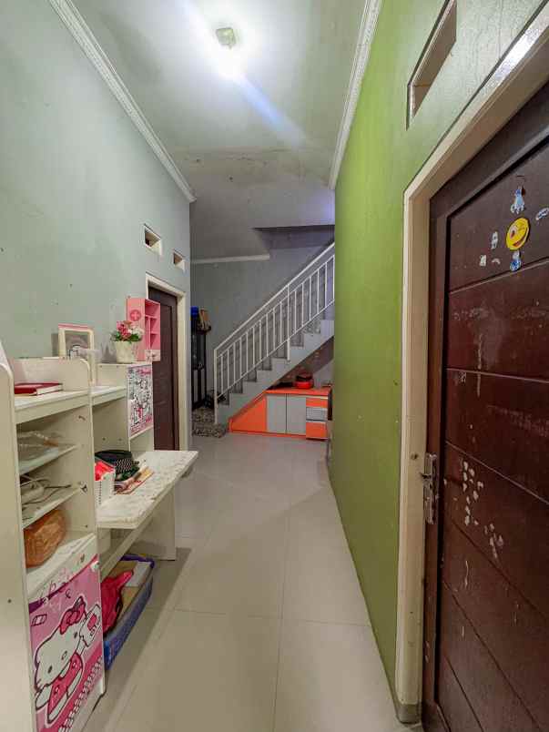 rumah second di perumahan bintara jaya village bekasi