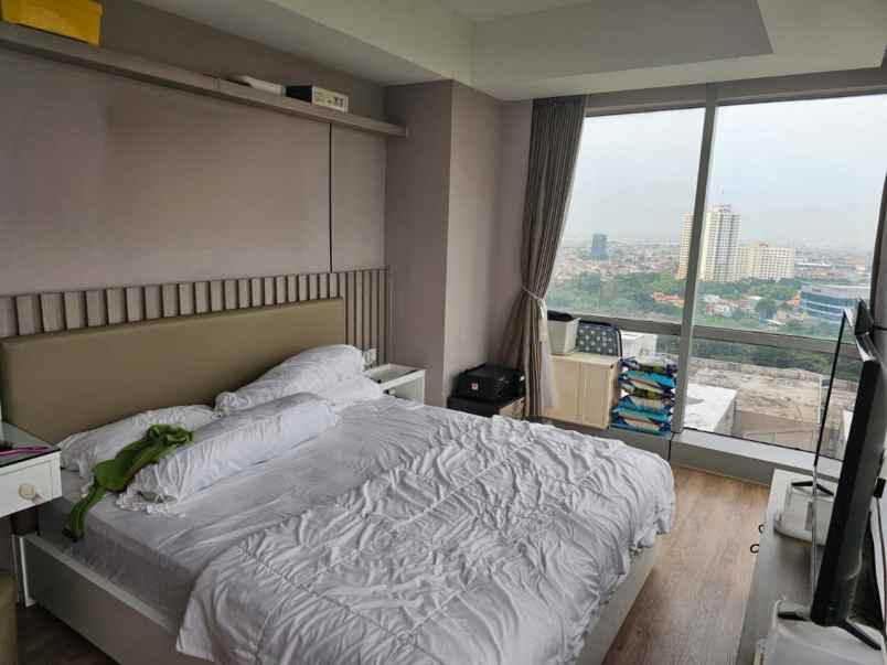 sewa apartemen grand sungkono lagoon