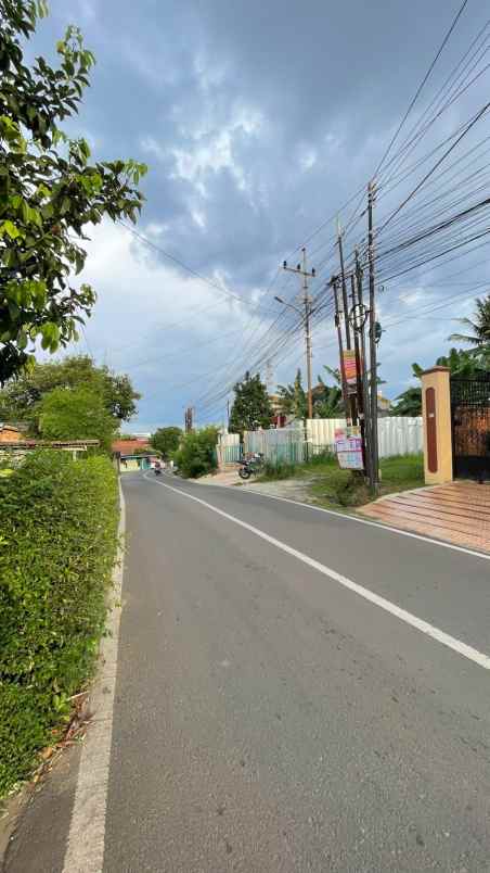 tanah pinggir jalan sukatani dekat pom blk