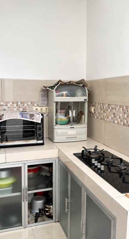 dijual rumah cluster aralia harapan