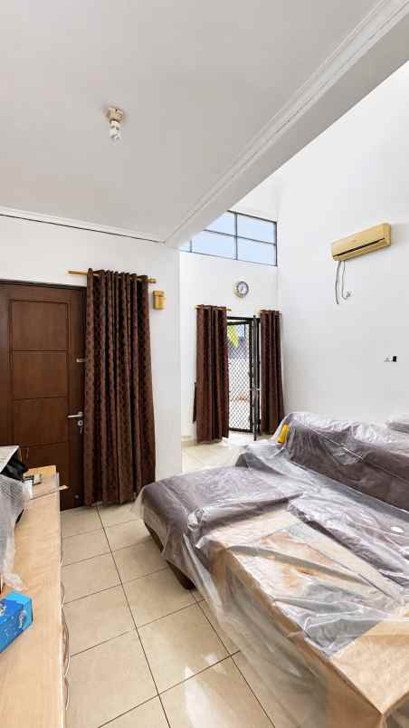 dijual rumah cluster aralia harapan