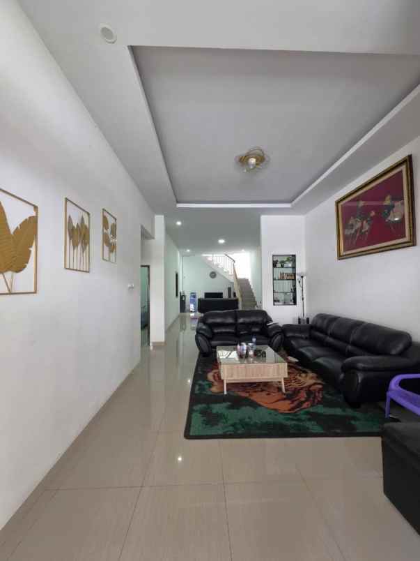 dijual rumah cluster taman sari kota