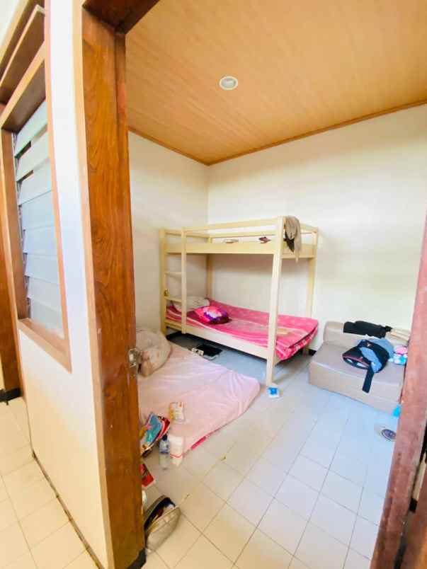 dijual rumah dharmahusada indah