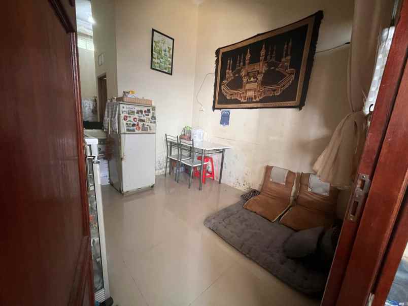 dijual rumah jl caringin