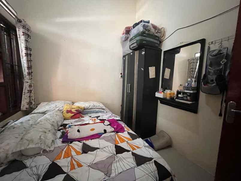dijual rumah jl caringin
