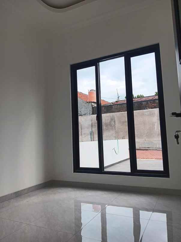 dijual rumah jl raya caman jatibening