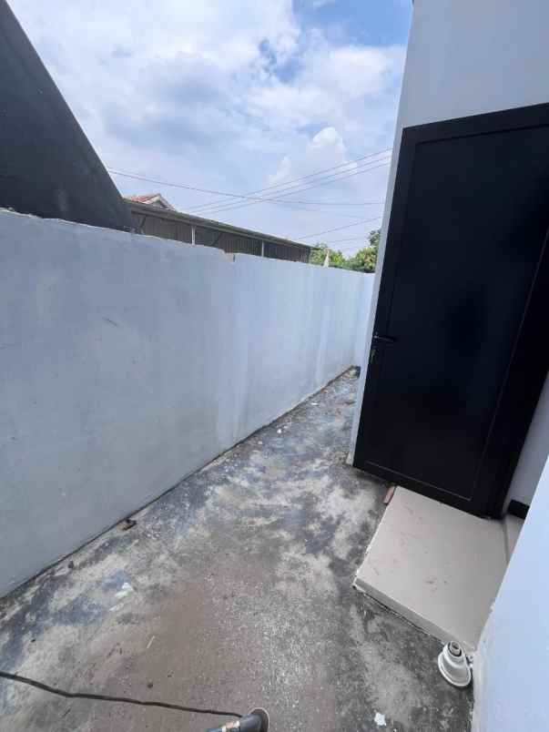 dijual rumah jl raya cimuning kota bekasi