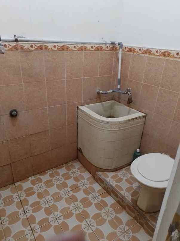 dijual rumah jl soekarno hatta koto