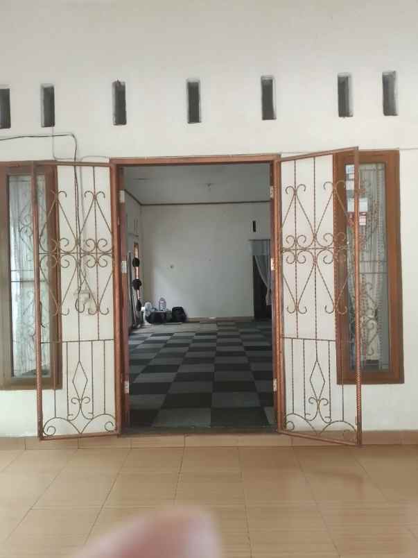 dijual rumah jl soekarno hatta koto