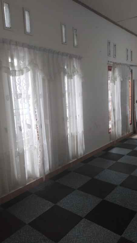 dijual rumah jl soekarno hatta koto