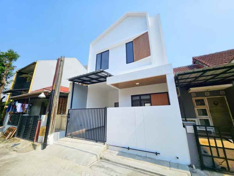 dijual rumah perumahan taman harapan
