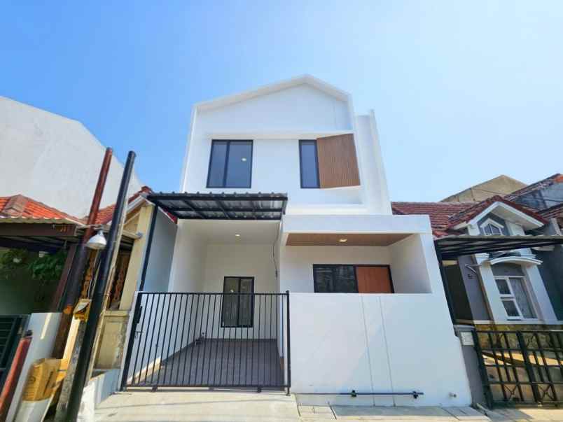 dijual rumah perumahan taman harapan