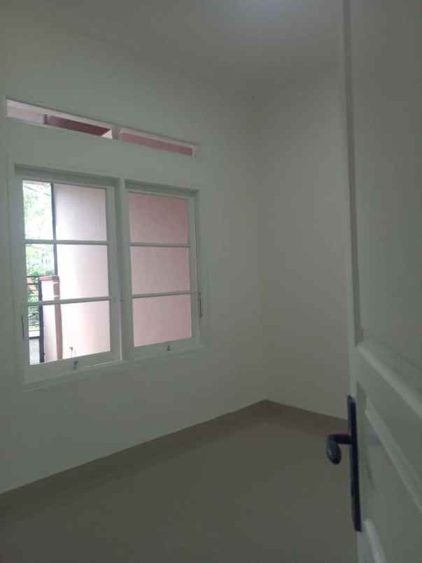 dijual rumah taman harapan baru