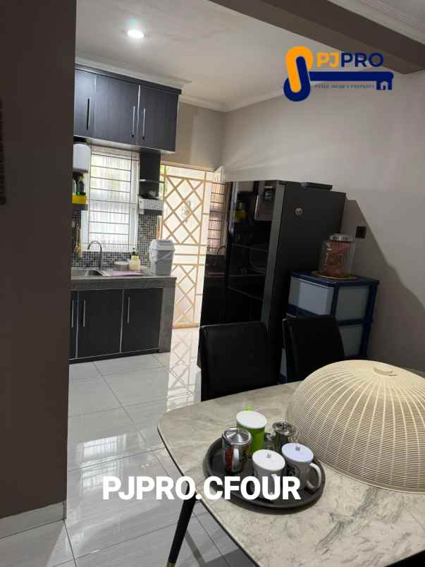 dijual rumah taman modern