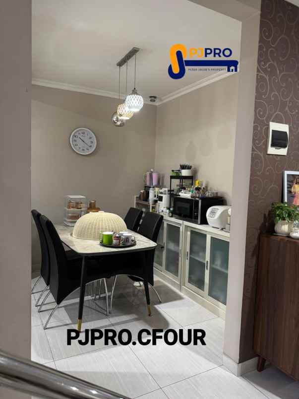 dijual rumah taman modern