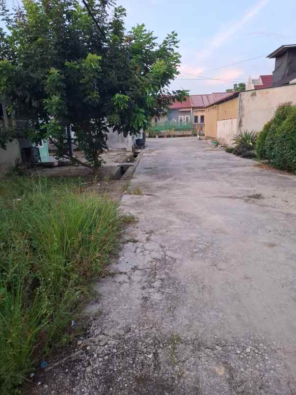 over kredit rumah jl suka karya kualu panam