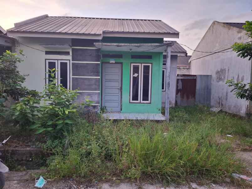 over kredit rumah jl suka karya kualu panam