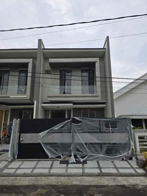 rumah dharmahusada indah new minimalis