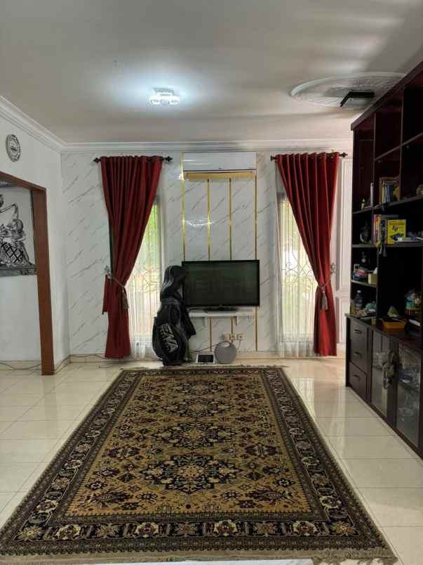 rumah hook elite premium di raffles hills cibubur