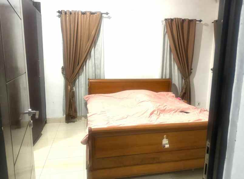 rumah hook elite premium di raffles hills cibubur