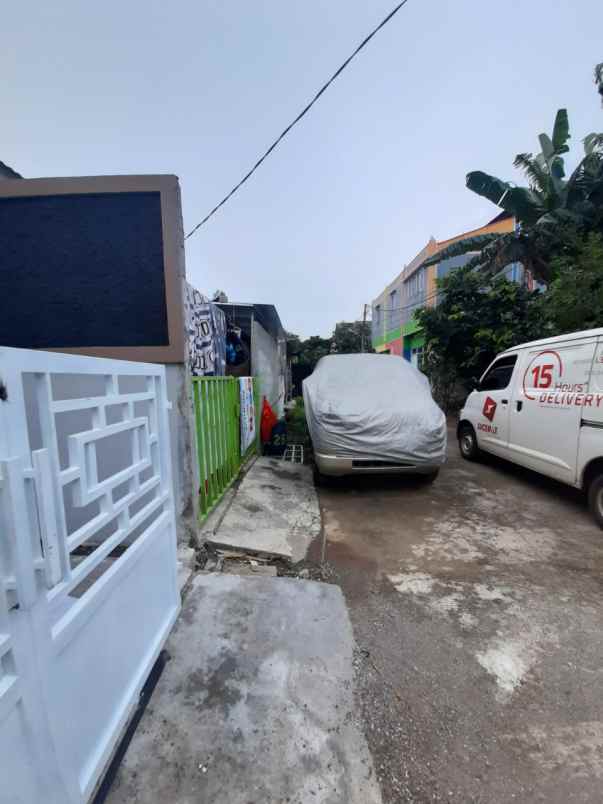 rumah jl raya harvest city