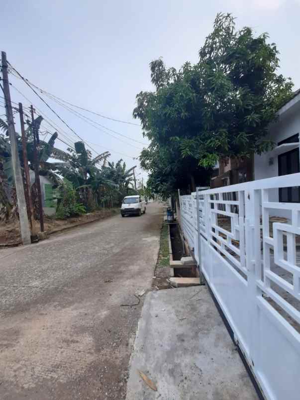 rumah jl raya harvest city