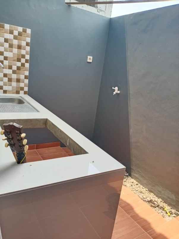 rumah jl raya sawangan rangkpan