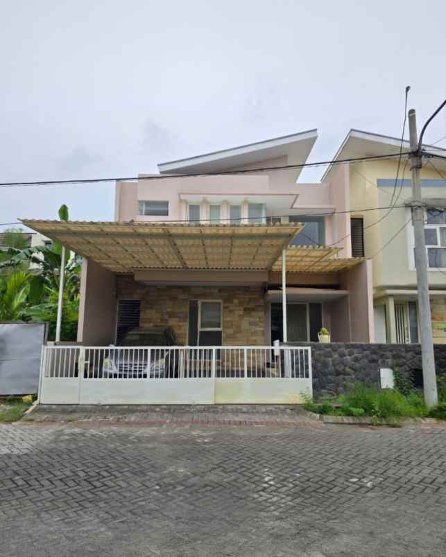 rumah pantai mentari minimalis siap huni carport 2