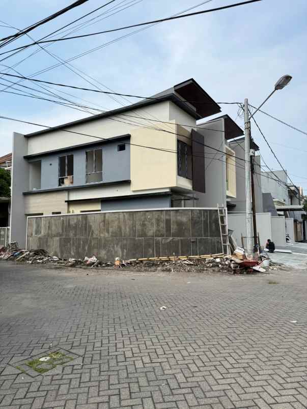 rumah unit c hook row jalan 3 5mobil surabaya