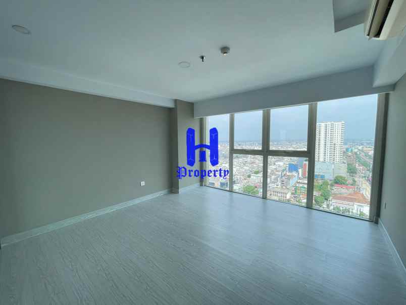 turun harga jual apartemen grand jati junction medan