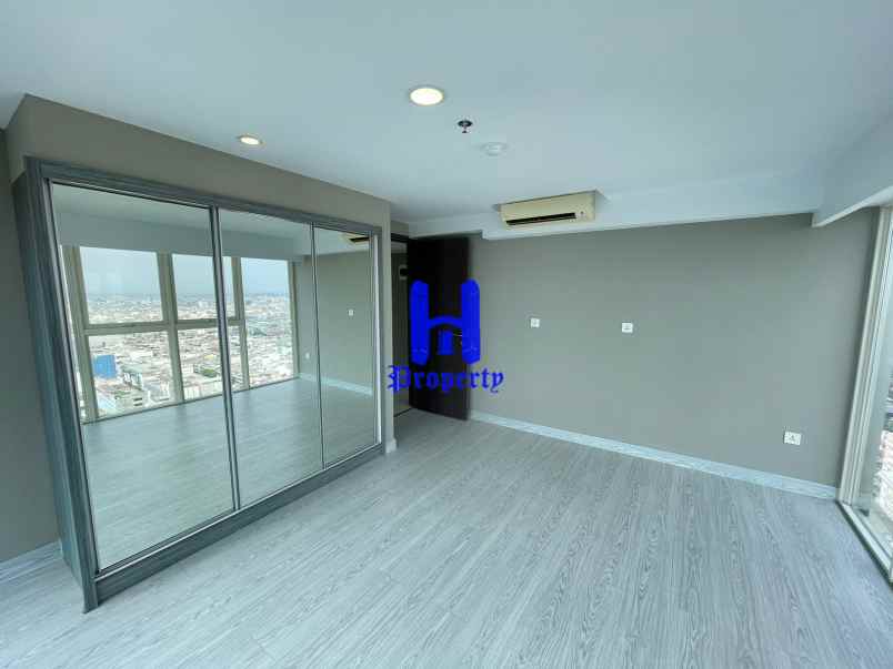 turun harga jual apartemen grand jati junction medan
