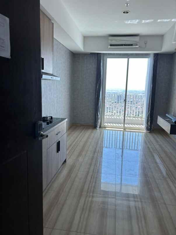 apartemen grand sungkono lagoon surabaya barat