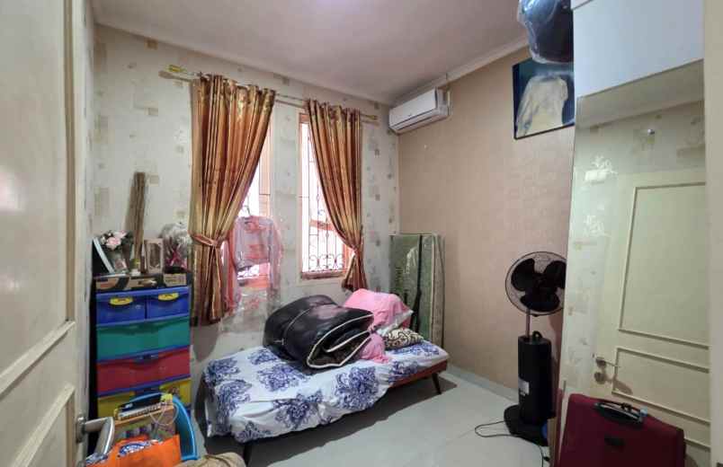 dijual rumah cluster taman puspa kota