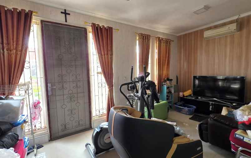 dijual rumah cluster taman puspa kota