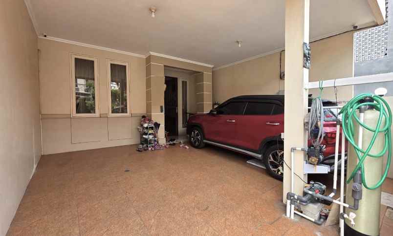 dijual rumah cluster taman puspa kota