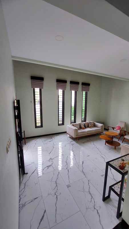 dijual rumah dharmahusada indah