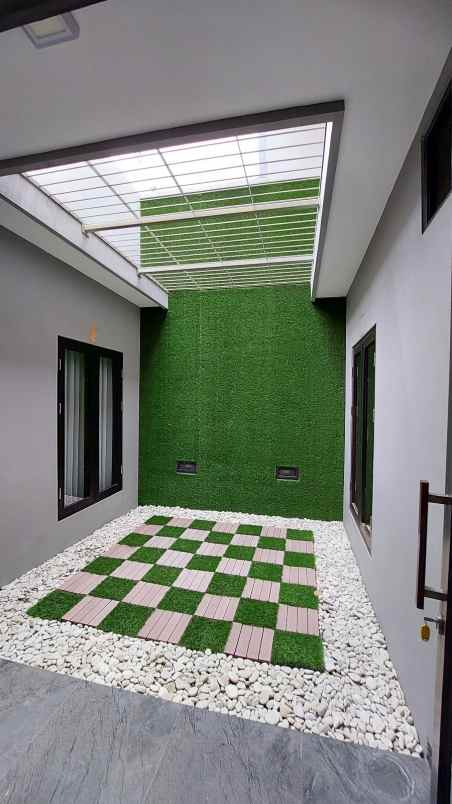 dijual rumah dharmahusada indah